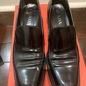 Vintage black Prada loafers.